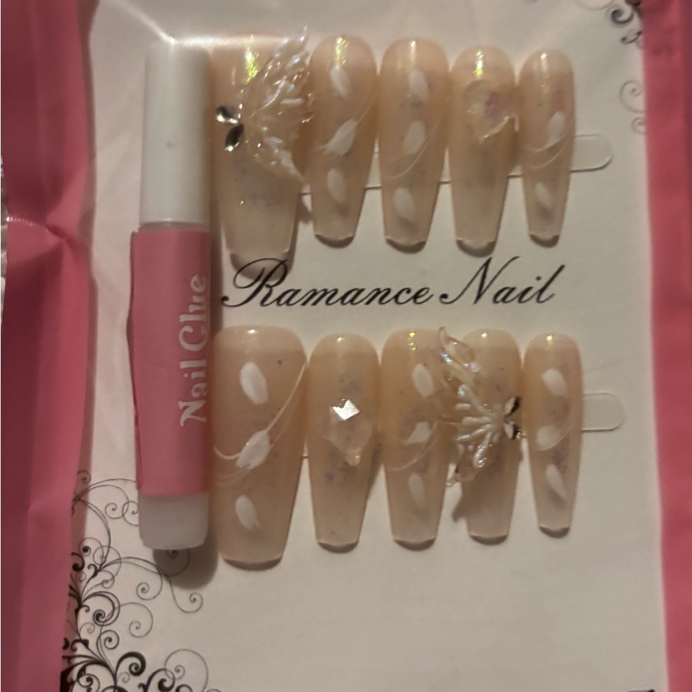 Elegant Nude Press-On Nails with White Accents